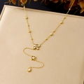 Elegant gold butterfly and rose pendant Y-necklace displayed on a luxury jewelry box - Gold Butterfly Rose Flower Water Drop Pendant Style (N3997)
