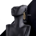 Golden titanium steel twist square earrings on model with 2.9cm total length - Gold