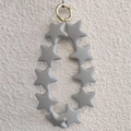 Cute grey star silicone keychain pendant with golden ring clip on white background - Glacier Gray (Dark) (10 Stars)