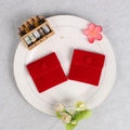 Red plush velvet jewelry pouch with snap button closure on a ceramic display plate - Double-sided Plush Style (Red) / 7x7cm