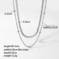 Detailansicht der silbernen Schlangenkette mit 0,35 cm Breite und 40+5 cm Längenangaben - Halskette (XKN0165) / Stahlfarben