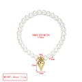 Detail of beaded pearl bracelet featuring gold heart charm with precise size measurements - 3D Heart (LE19GD09)