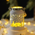White Christmas porcelain lantern with hollowed-out star and tree design and warm light - Flowing Light Bottle / White
