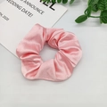 Pink satin silk scrunchie with French retro style on white background with leaves - Pink