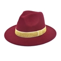 Detail of burgundy wool fedora hat featuring a sparkling gold glitter ribbon band - Burgundy