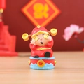 Cute red God of Wealth desktop ornament with gold coins for festive home office decor - Caishen Wave Base