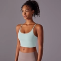 Detail of mint blue cropped yoga tank top with thin straps and seamless ribbed texture - S / Island Mist