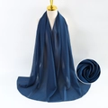 Navy blue pearl chiffon scarf worn by a model with detailed fabric texture close-up - Red