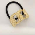 Modern gold hammer textured metal hair tie with black elastic band for minimalist styling - Curved Pattern Chain Gold