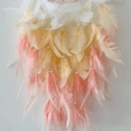 Handmade dreamcatcher featuring gradient white, yellow, and pink feathers with pearls - Finished Product / Pink