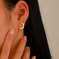 Vintage golden crescent moon stud earrings with textured lava drip design on model - Light KC Gold (A-784)