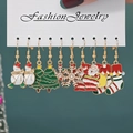 5-pair Christmas earring set with snowman, Santa, and tree in gold enamel finish - Style 33 (5 Pairs Set)