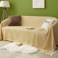 Yellow waffle textured cotton sofa throw blanket with decorative tassels on a couch - 90x90cm / Yellow