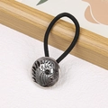 Western cowboy style hair tie featuring silver metal concho with bird motif and black band - Goddess-Black