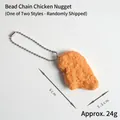 Portachiavi realistico a pepita di pollo fritto con catenella, lungo 6cm e peso 24g - Nugget di Pollo Catenina a Sfere