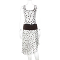 Detail of polka dot crop top and high-waisted irregular skirt set for women - S / White