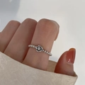 Minimalist silver beaded ring featuring a delicate flower design on a model hand - Flower Beaded Open Ring (J2173)