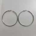 Minimalist large silver hoop earrings with pin closure on a clean white background - 6cm / Silver