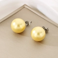 Detail of golden satin pearls with 12mm round luster on titanium steel stud earrings - 10mm / Steel Base Golden Yellow Pearl (KE116393-K)