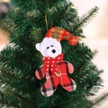 Christmas bear plush pendant with tartan plaid hat and scarf hanging on a green tree - Plaid Fabric Bear