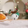 White metal Christmas bell with star cutouts, pine cones, and red berries on jute rope - Forest Style Single Bell - White