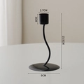 Minimalist black iron candle holder with 15.5cm matte finish stand and round base - Curved Candlestick Single Head - Black