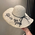 Straw beach hat with Life is Good embroidery and black bow detail in natural beige - Beige Embroidered Hat