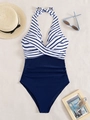 Detail of navy blue and white striped one-piece swimsuit with halter neck and ruched waist - Blue White Stripe with Navy