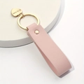 Pink leather keychain with gold hardware and engraved heart pendant charm for accessories - Pink