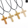 Natural stone cross pendants in orange and beige tones with black cord necklaces - Yellow Jade