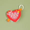 Red heart-shaped electronic handheld game toy with cute cartoon seal buttons - Heart with Arrow