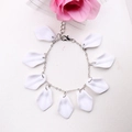 Detail of silver chain bracelet with white petal charms and lobster clasp closure - White - Bracelet
