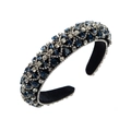 Detalle de diadema ancha de terciopelo con gemas azul oscuro y cristales brillantes - Azul