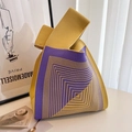 Detailed knit tote bag with purple and yellow geometric patterns in a lifestyle setting - Yellow Nordic Geometric