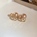 Macro shot of elegant champagne gold and pearl earrings with stylish metal link accents - 63# Silver Pin Champagne Pig Nose Pearl