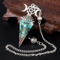 Blue turquoise resin pendulum necklace with copper coil and silver crescent moon star - Blue Turquoise (Synthetic)