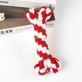 Detailed view of red and white braided cotton rope bone toy for dogs on a clean desk - Christmas Red & White Bone 16cm (65g)