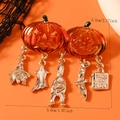 Halloween pumpkin brooch with trick or treat charms measuring 5.5cm by 5.0cm - Halloween Pumpkin Pendants (WBR290)