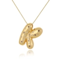 Close-up of 18k gold plated letter K pendant with sparkling cubic zirconia on a fine chain - Letter K