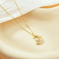 Gold plated moon and heart pendant necklace with sparkling cubic zirconia on soft fabric - Gold