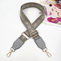 Detail of 3.8cm wide jacquard strap with gray-brown geometric pattern and gold hooks - Dark Gray + Gray