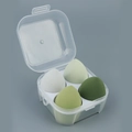 Set of four green makeup sponges in various shades with a transparent storage box - 4-Grid Transparent Green Series