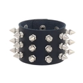 Close-up of black leather punk bracelet with three rows of silver metallic spikes - Navy Blue