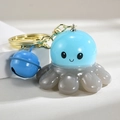 Sky blue and transparent gray octopus keychain with golden ring and blue bell accessory - Bell Style [Blue]