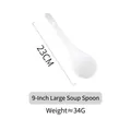 Detail view of 9-inch white ceramic long handle soup spoon with a hanging hole design - 23cm Large Soup Spoon / Pure White