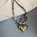 Detail of leopard print heart pendant necklace with retro textured fabric background - Necklace-Brown-Gold-Double Layer