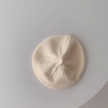 Detailed close-up of cream knit baby beret showing intricate texture and soft fabric - 45-48cm (6 Months-3 Years) / Cream