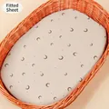 Detailed view of moon and stars pattern on a breathable cotton baby cradle fitted sheet - Khaki Moon Print / 81*41 cm