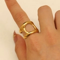 Polished 18K gold-plated stainless steel hollow geometric ring on a female finger - 18K Gold Wide Hollow (9125)