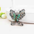 Vintage butterfly brooch with green rhinestones and enamel on antique silver metal - Green (2122)